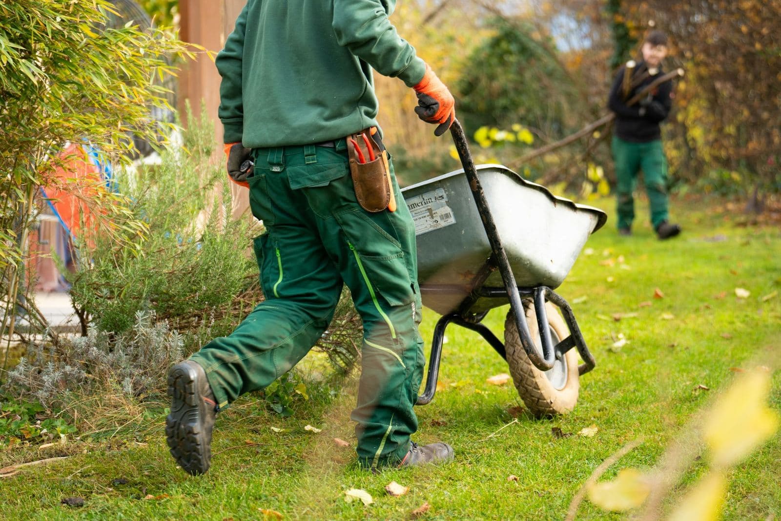 Landscaper laying a stone walkway
