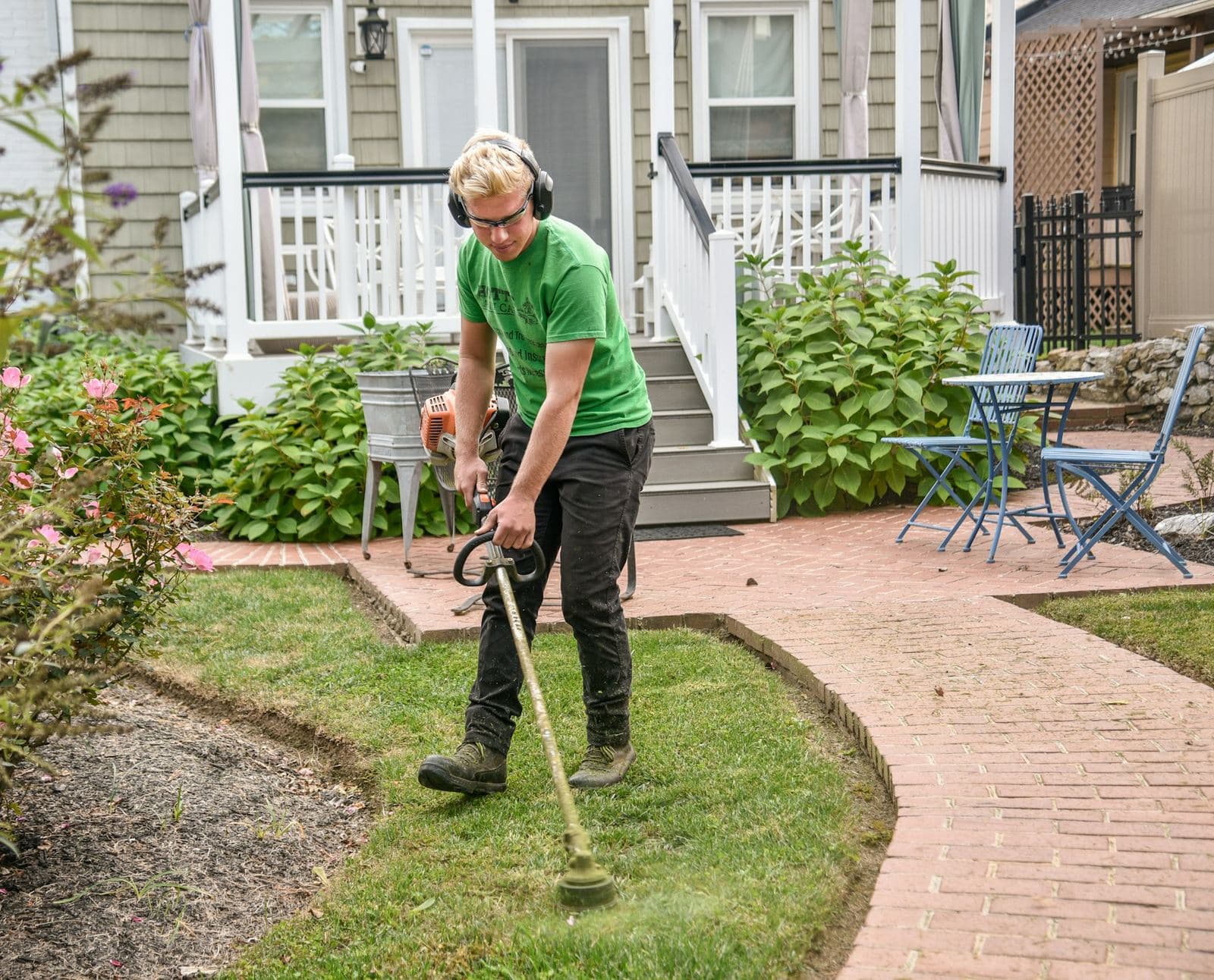 Crew finishing a residential garden path